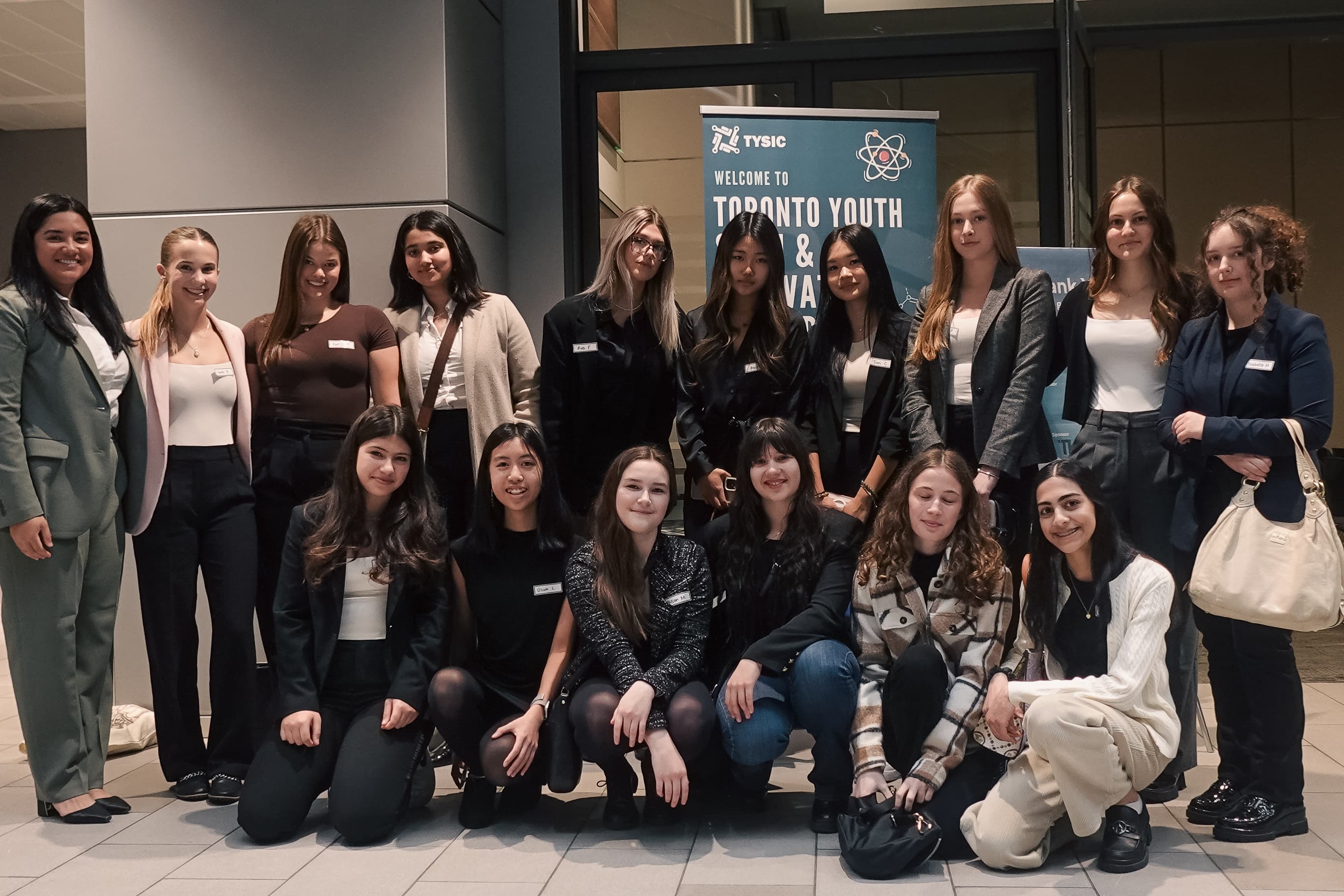 The TYSIC student team and attendees at the conference