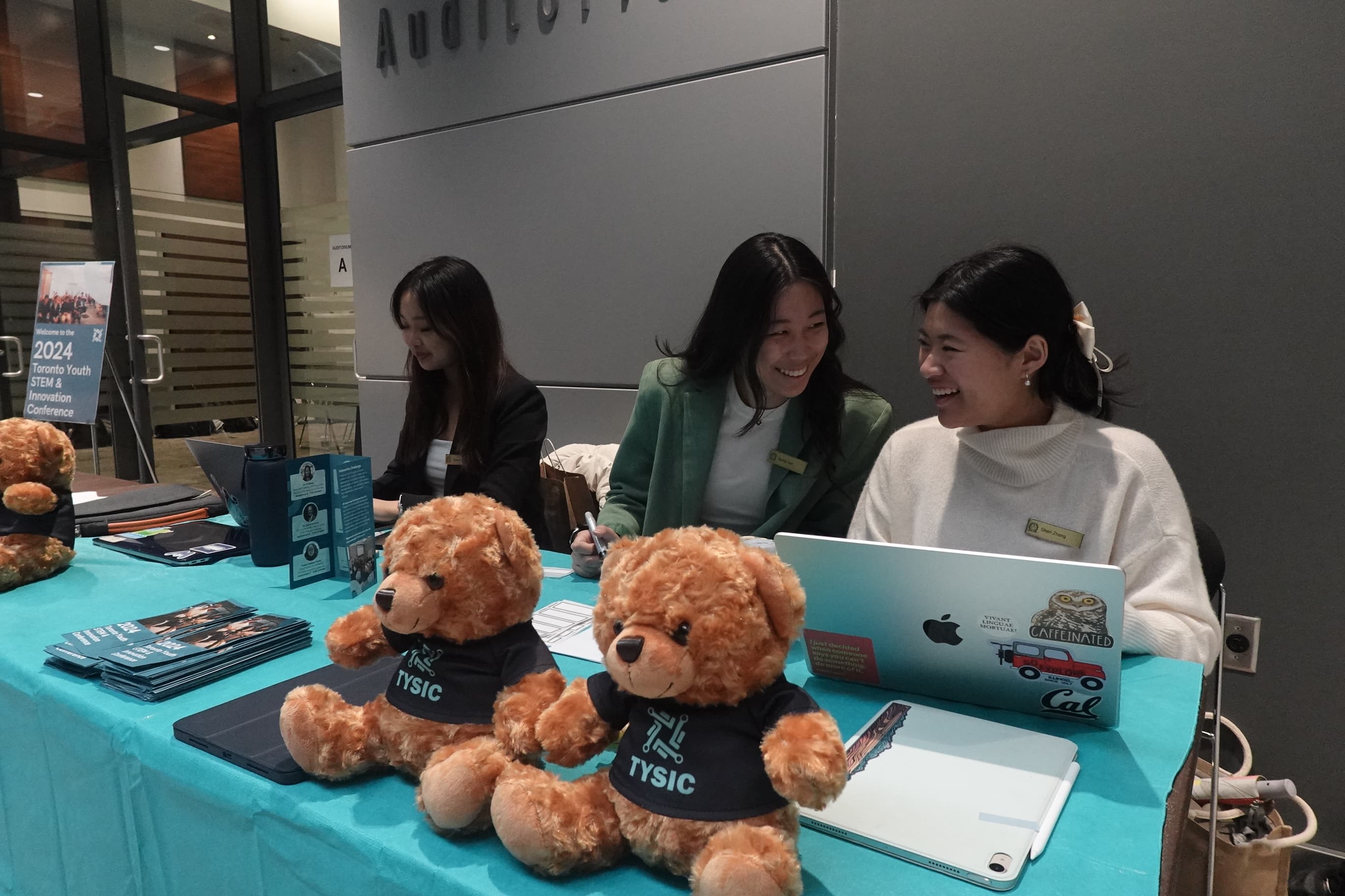 Students at a TYSIC sponsor and partner booth